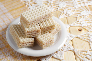 Delicious wafers on table