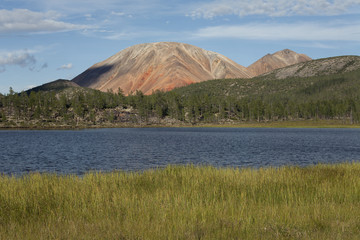 The lake and the mountains. Oimyakon Highlands. Yakutia. Russia.