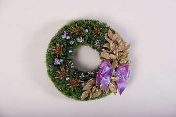 Artificial flowers wreath isolated on white