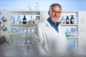 Senior chemistry professor/doctor in a lab