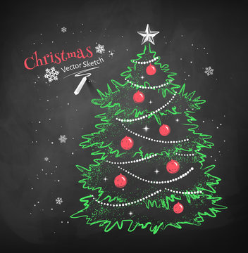 Christmas tree on black chalkboard background