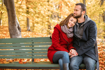 Nice concept for young couple in autumn park