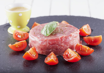 Raw meat and tomatoes