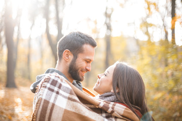 Nice concept for young couple in autumn park