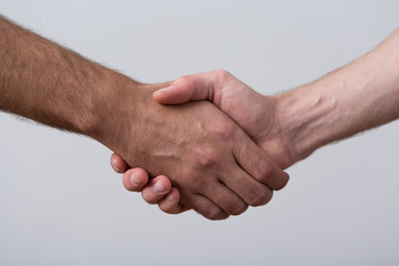 Close-up of people shaking hands