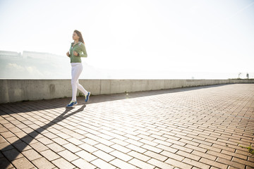 Young woman running in the park