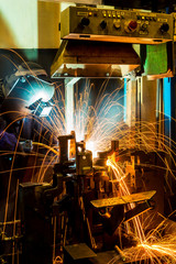 MIG welder uses torch to make sparks during manufacture