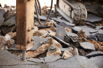 Close Up Of Jackhammer Breaking Up Road Surface