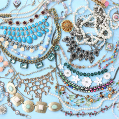 Fashion jewellery on light blue background