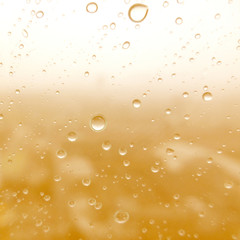 Close-up of water drops on glass surface as background