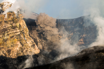 The summit craters of the Etna volcano erupting