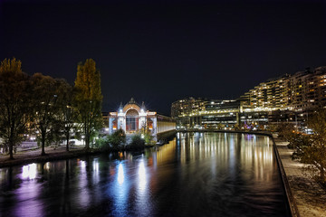 Fototapeta na wymiar Night photo of Rhоne River and city of Geneva, Switzerland