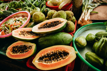 papaya cut at tropical market in asia