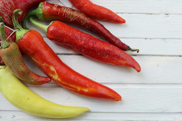 Paprika on white wooden table