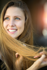 Fototapeta premium Smiling young blonde girl