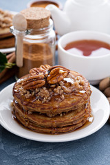 Cinnamon and spices pancakes with pecan nuts