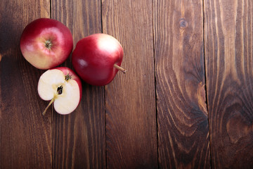 apples on the old wooden background