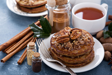 Cinnamon and spices pancakes with pecan nuts