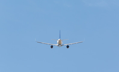 white plane takes off