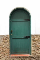Wooden door of colonial house in La Paz, Bolivia