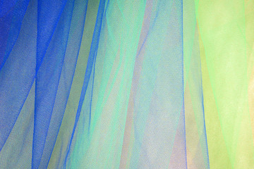Colorful Tulle on Satin Fabric Background
