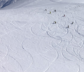 Snowboarder downhill on off piste slope