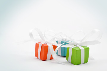 Gifts for Christmas or a birthday - three colourful packages