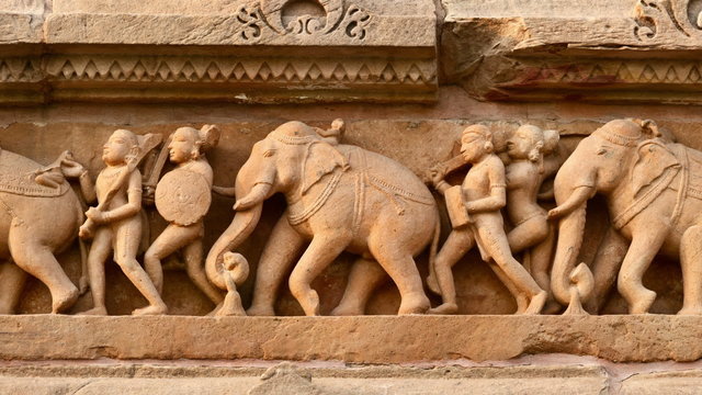 Panning of stone carving bas relief, Lakshmana Temple, Khajuraho, India. Unesco World Heritage Siteing bas relief panorama, Lakshmana Temple, Khajuraho, India. Unesco World Heritage Site