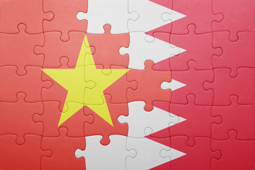 puzzle with the national flag of bahrain and vietnam
