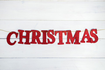 Word Christmas made from Red Glittering Letters Placed on the St