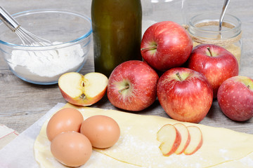 ingredients for apple pie, with flour and ciders
