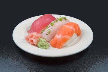Trio of Sushi with wasabi and ginger