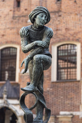 Obraz premium Sculpture poor student in the fountain