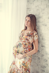 Fototapeta premium Portrait of pregnant woman