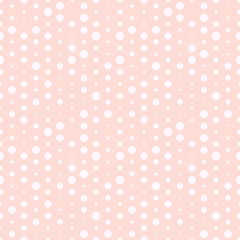 Cute pink and white dotted seamless pattern.