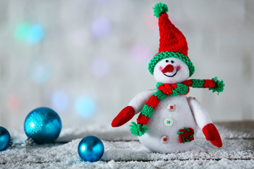 Cute snowman on Christmas background
