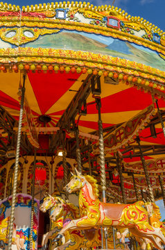colourful vintage horse carousel at a Fairground