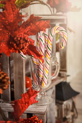 Christmas Candy Canes in glass on wooden box