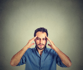 man thinking very intensely concentrating