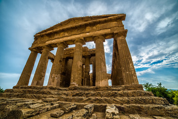 Fototapeta premium Agrigento, Sicily island in Italy. Famous Valle dei Templi, UNESCO World Heritage Site. Greek temple - remains of the Temple of Concordia.