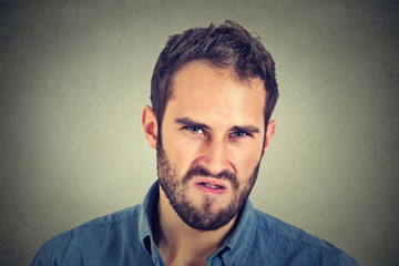 Annoyance. Angry displeased young man