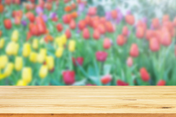 Wood table top on blurred background - can be used for montage o