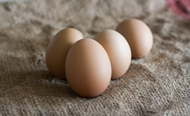 Still Life- laying eggs on burlap.