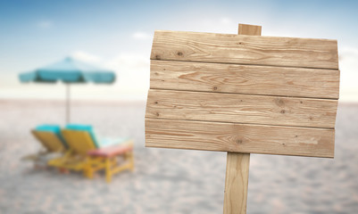 Vintage rustic wooden sign on the beach