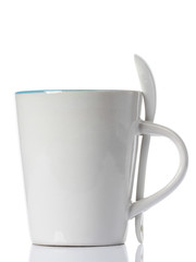 White ceramic mug. Isolated on a white.