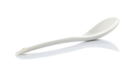 White plastic spoon isolated on white