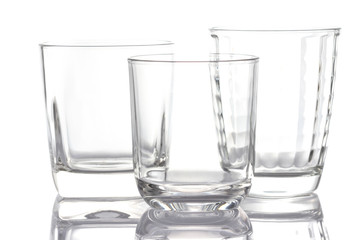 Empty drinking glass cup on white background.