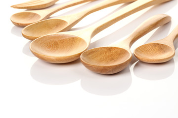 wooden spoon isolated over white.