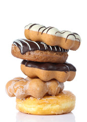 various donuts on white background