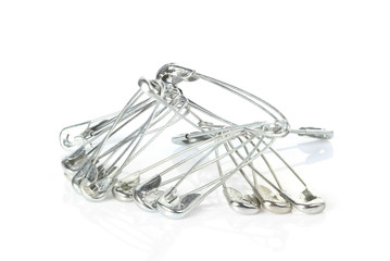 safety pins isolated on white background